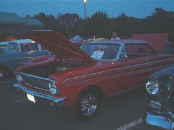 The always-wonderful Kevin Erhardt's '64 Ford Falcon Sprint with the 4-speed 289 engine.  Kevin rocks!  He gave my father a picnic table that folds to the size of a guitar case!  Very cool!