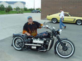 Fuzzy with old flathead V-8 motorcycle