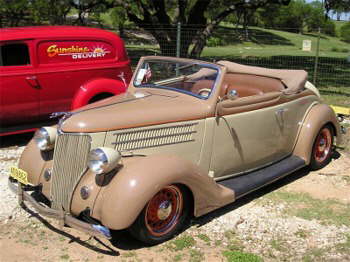 Larry and Debbie from Missouri City, Texas didn't show their last name, but they did show this fine '36 Convertible