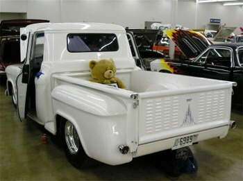 Elmer Holden drives this white '57 Chevy Apache