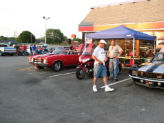 Vernon' The Cruiser' Lunsford and son David checking out the rides at Hardees