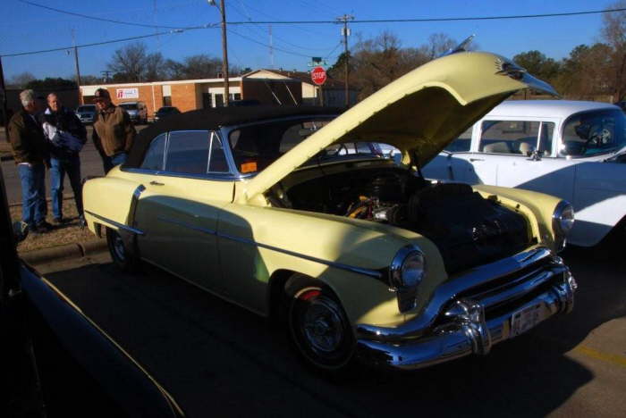 This Oldsmobile convetible had a crowd around it all day