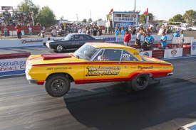 The AFX cars are always a good show. The Final pair were Joel Miners 64 Plymouth Belvedere (near lane) from San Diego, CA. vs. Lynsi Martinezs 69 Dodge Dart from Glendora, CA.  Joel won the race.