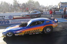 The Nostalgia Funny Car Final results in John Hale (far lane) beating Kris Krabill. In the process Hale sets a new ET record of 5.589 and wins the 2011 Reunion Nostalgia Funny Car Event.