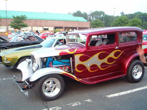 This car is great in the summer heat, as it has A/C!  It's a '32 Model B Ford with custom flames owned by Rich Oliver.