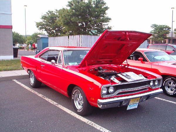 This is the '70 Plymouth Roadrunner of my paps, Jeff Gravatt of Brick, NJ.  There's a 383 engine in that baby!