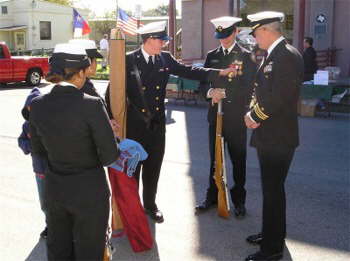 The color guard gets ready