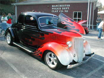 Doug Owens arrived in his slick, Flamed 36 Ford Cpe