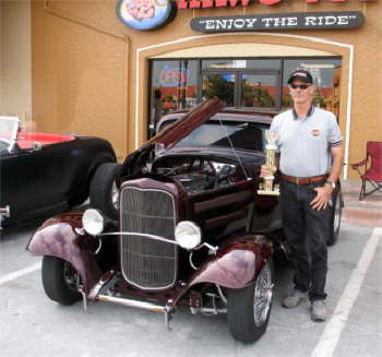 Larry Harris garnered the trophy for Best Closed 1932 Ford.  Brandywine paint, chrome wire wheels, and a lot of detail highlight the three-window coupe.