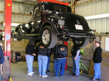 Under Ken McDonald's Plymouth coupe