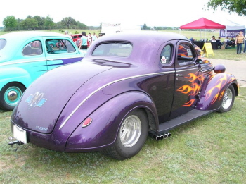 Doyle McGee from Corsicana likes a lot of exhaust on his  '37 Dodge coupe