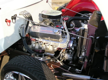 Ron and Carl Foote's 55 F-100 features a Ford engine looking good!