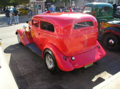 20  This flaming '34 sedan is owned by Nick  and Lyn Young