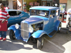 34  James and Terri Williams cruise in this '30 Ford Sedan