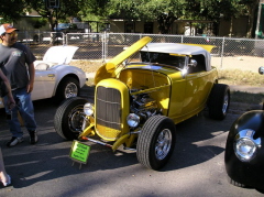 78  Larry and Molly Krueger show off their slightly yellow roadster
