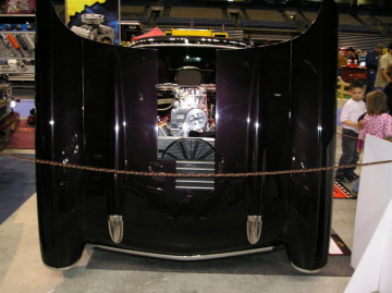  Roland and Ida Ramirez feature a tilt front end on their '57 Chevy