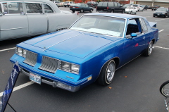 low and blue Olds