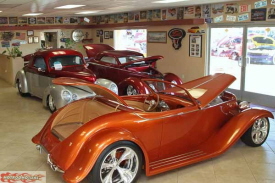 Inside American Classic Cars showroom are beautiful cars and lots of fun memorabilia.