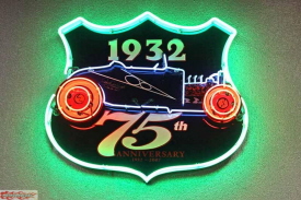 The Garage is a jewel with colorful neon signs around the walls, posters and signs hanging from the ceiling and lots of gas station memorabilia.