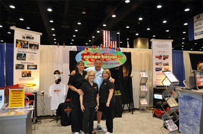 Booth at Louisville show 2009 with staff and roving reporter
