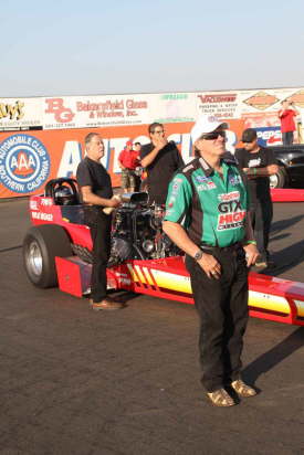 John Force was checking out the action.