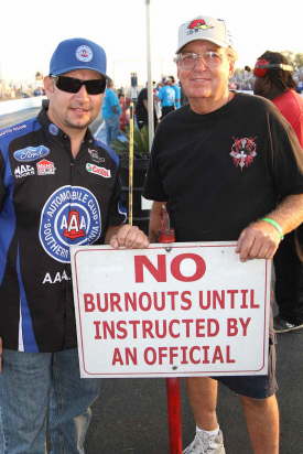 NHRA Funny Car pilot Robert Hight hangs out with Mr.Woodpecker George Stregal.