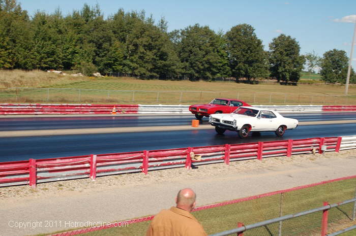 pair of Pontiacs racing