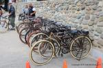 Many of the cars owners have taken to two wheels with their  antique bicycles.