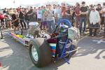 This legendary “Kuhl & Olson” Top Fuel dragster is cackling with Carl Olson in the  seat.
