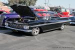 This very clean ’59 Chevy Impala belongs to Paul Branam of La Palma, CA. Paul  also managed to get the 55’ flat screen he won in the back seat!!