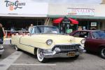 Linda Taylor brought her father’s, very long, ’55 Cadillac  	series 62 convertible with continental kit.