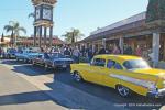 Under the clock tower, the winning cars are driven in front of the spectators to receive their awards.