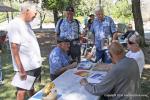 “Bench racing” with Ed Iskenderian (seated w/cap & blue shirt).