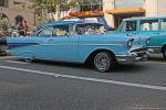 This customized ’57 Chevy Bel Air sports a continental kit, skirts, duel aerials, sun shade and nice graphics. The owner is Ismael Ruvalcaba.