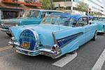 This customized ’57 Chevy Bel Air sports a continental kit, skirts, duel aerials, sun shade and nice graphics. The owner is Ismael Ruvalcaba.