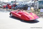 A ruby candy red, mid-engine Chevy powered Convertible Coupe  	called “Speedliner”.