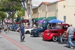 Before the event opened, vintage cars were staged along the street.
